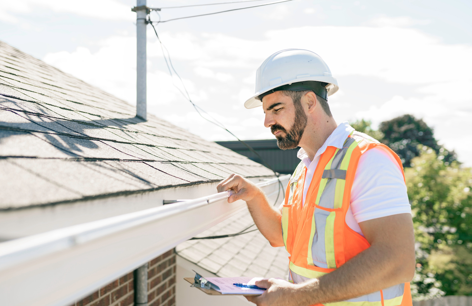 When to Get a Roof Inspection After a New Roof Installation inspector