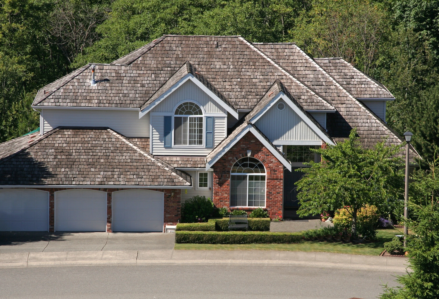 nice home in culdesac with steep cedar shake roof