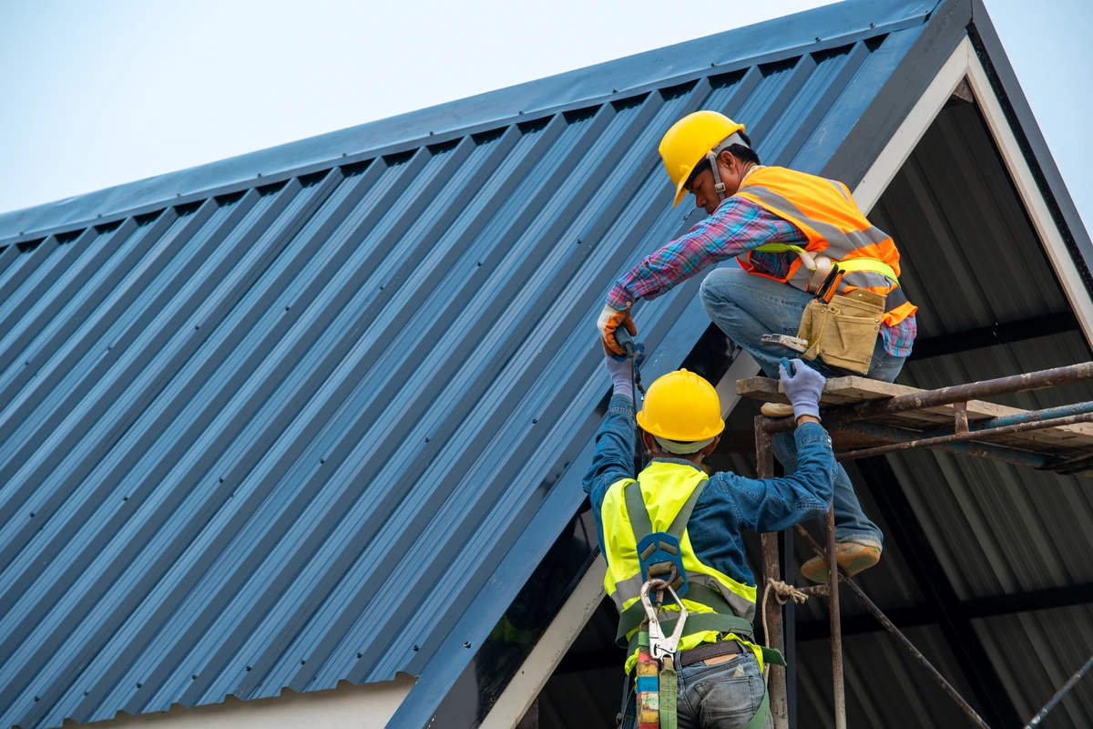 working on a metal roof