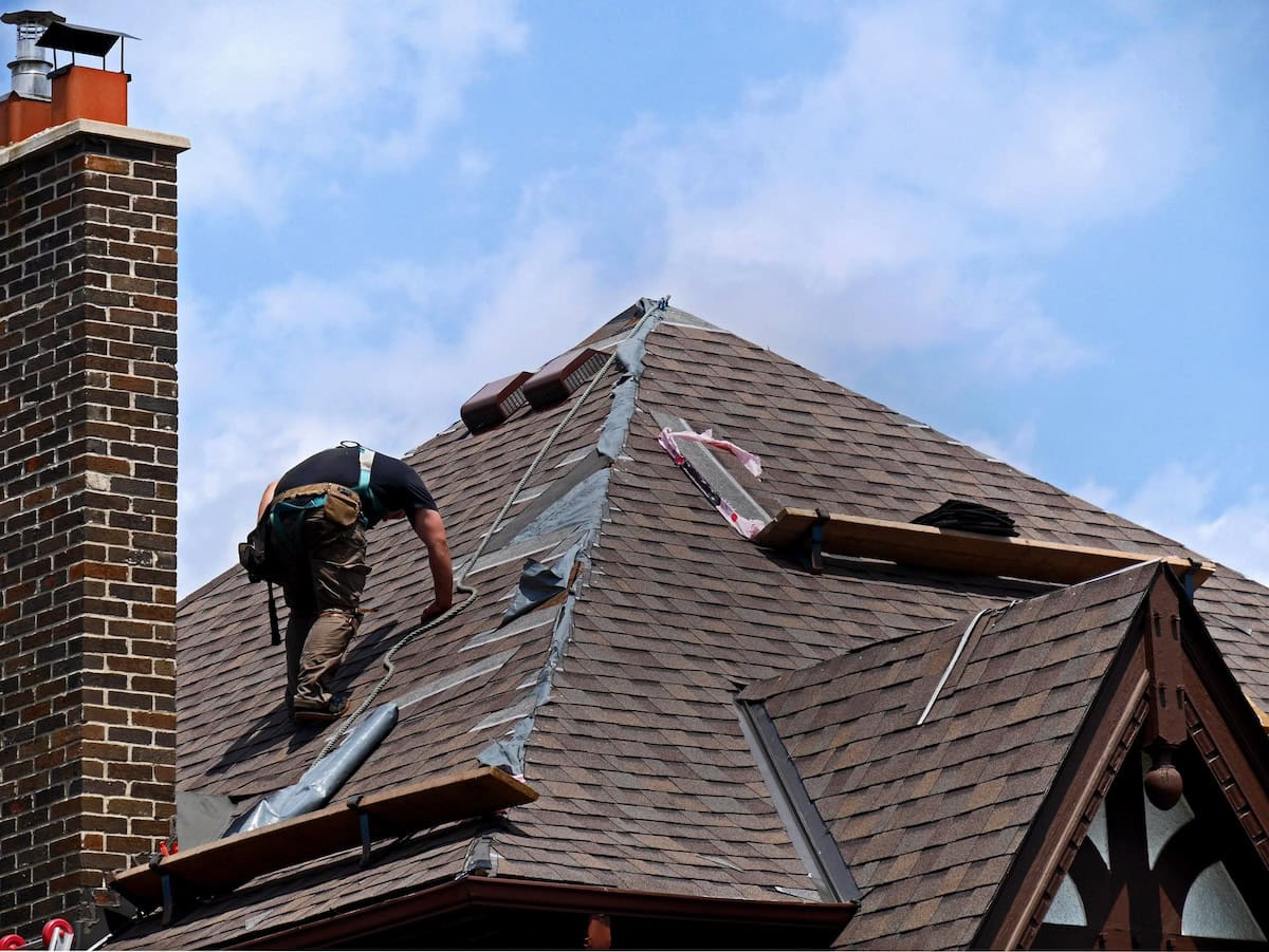 Roof repair, partial replacement brown shingles