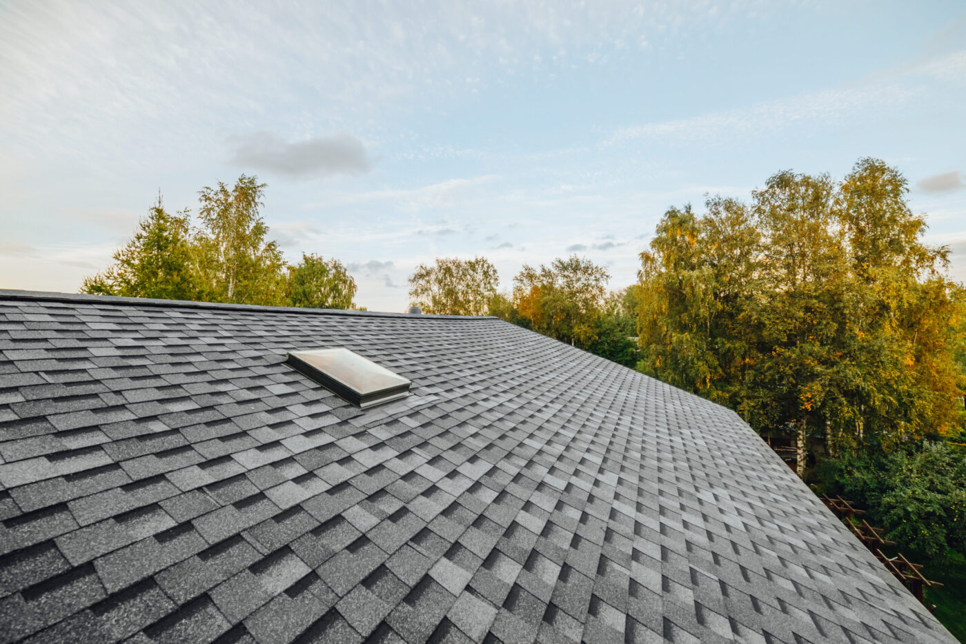 renovated roof covered with shingles flat polymeric roof-tiles