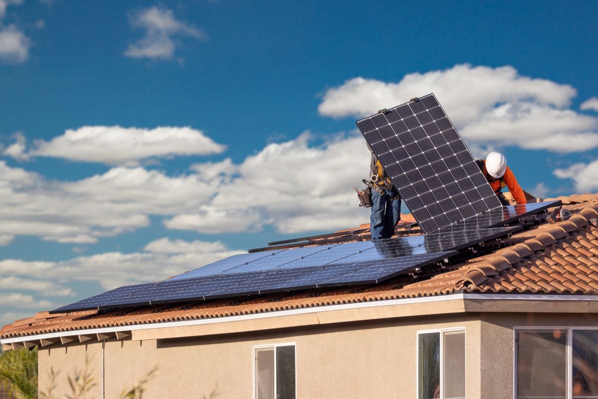 solar panel roofs workers installing new panels